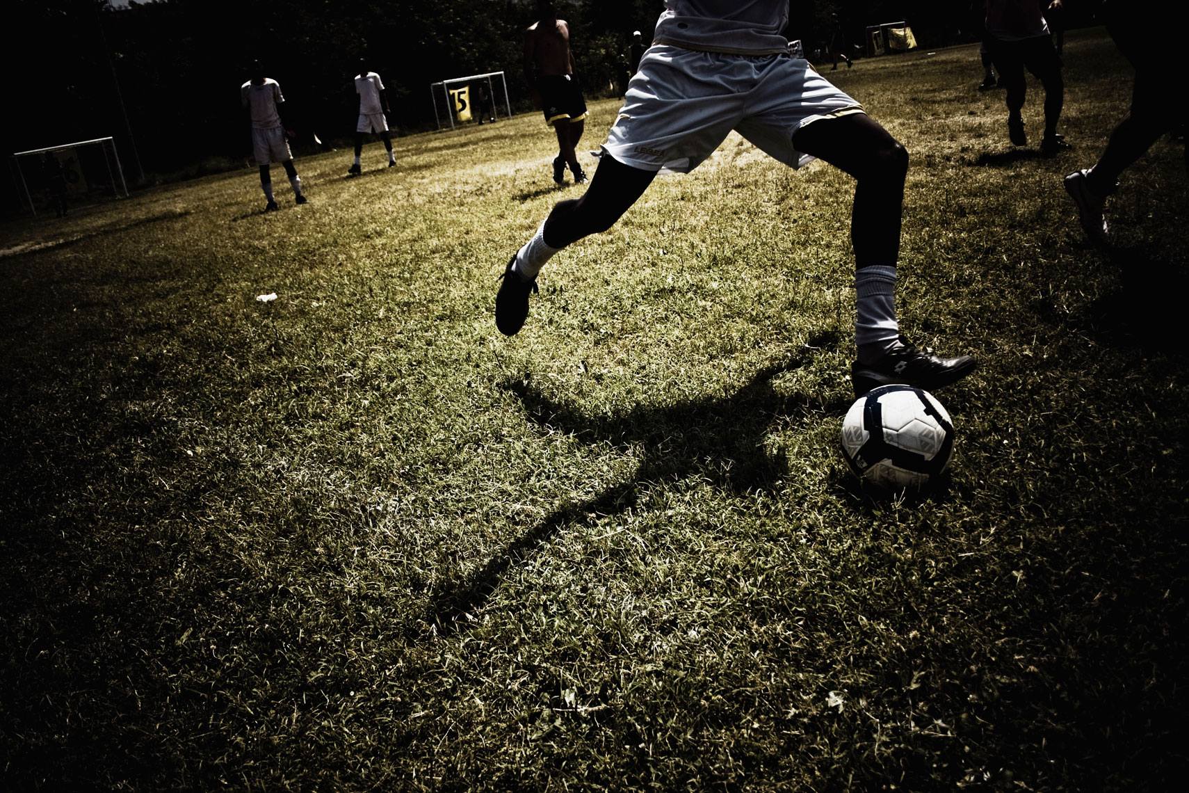 ITALY. Casalecchio di Reno, Bologna, 10th July 2010. During the "Anti-Racist World Cup". One of the members of a soccer team composed by Somali refugees who are living in a shelter for refugees located in the building of the former "Hotel Real" in the outskirts of Florence.