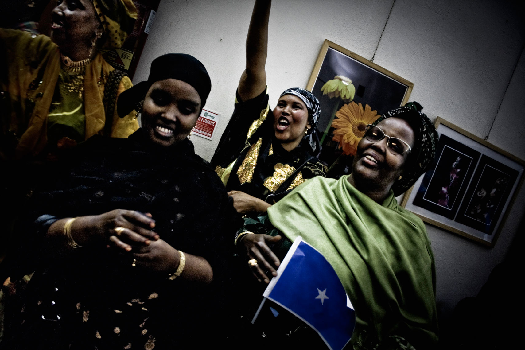 ITALY. Florence, 4th July 2010.  Celebrations for the 50th anniversy of the Somalia's indipendence day (1st July 1960). Some somali refugees listen to the speech of Nur Hassan Hussein, also know as Nur Adde, prime minister of Somalia from November 2007 to Februaty 2009.