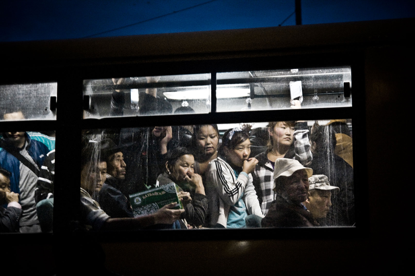 MONGOLIA. Ulan Bator, 2012. People on a bus.