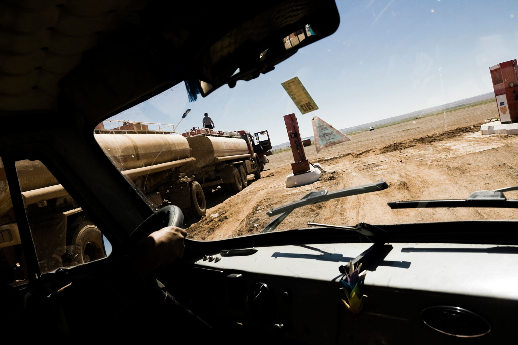 MONGOLIA.  Gobi desert, 2012 A tank supplies a gas station.