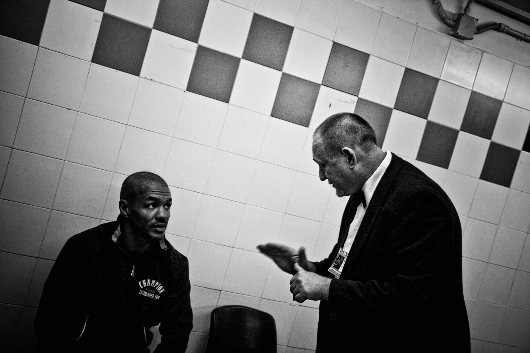 ITALY. Florence, 4th November 2011. Mandela Forum, the night of the match for the EBU (European Boxing Union) Welter Weight crown, Leonard Bundu inside the locker room listening to the referee who explains him the fairlplay rules to follow during the match.