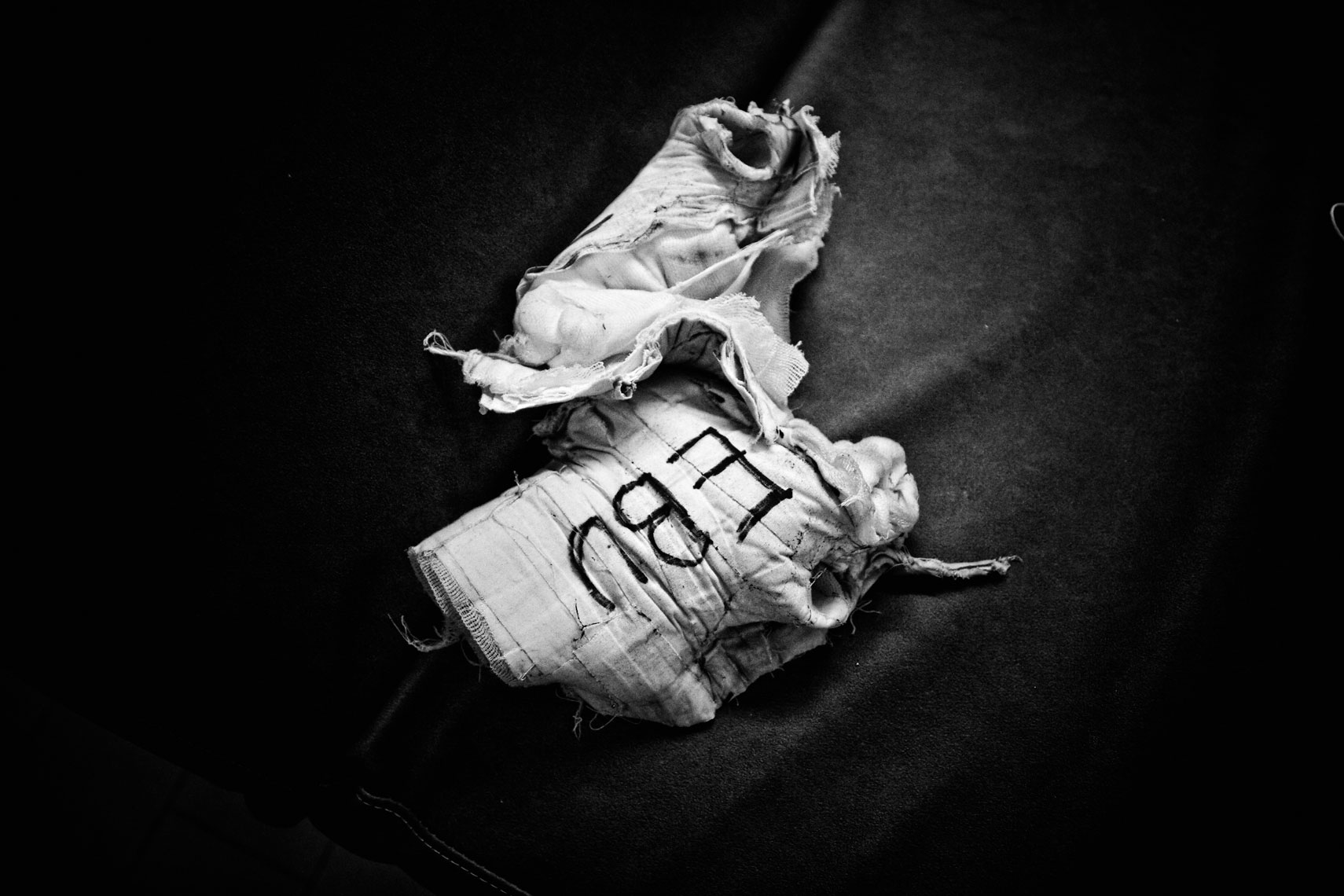 ITALY. Florence, 4th November 2011. Mandela Forum, the night of the match for the EBU (European Boxing Union) Welter Weight crown. After the victory. Leonard Bundu's bandages.